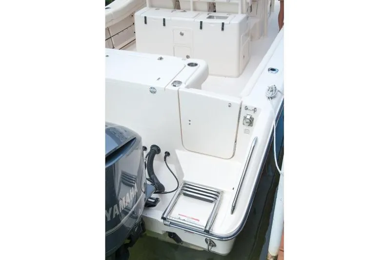  Yacht Photos Pics Manufacturer Provided Image: 2016 Grady-White Canyon 336 boat stern with Yamaha outboard motor and swim ladder.