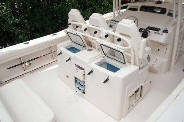  Yacht Photos Pics Manufacturer Provided Image: 2016 Grady-White Canyon 336 boat interior with seating and storage compartments.
