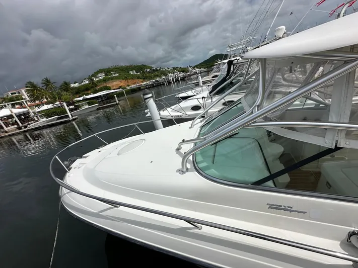  Yacht Photos Pics 2006 Hydra-Sports 2900 VX boat docked at a marina with scenic background.