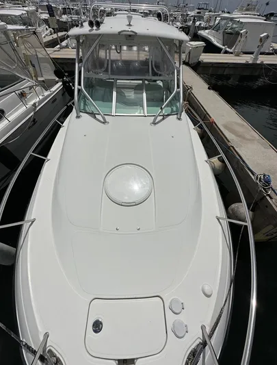  Yacht Photos Pics 2006 Hydra-Sports 2900 VX boat docked at a marina.