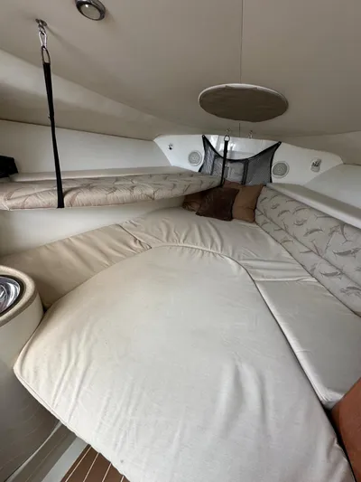  Yacht Photos Pics Interior cabin of 2006 Hydra-Sports 2900 VX with cushioned seating and storage.