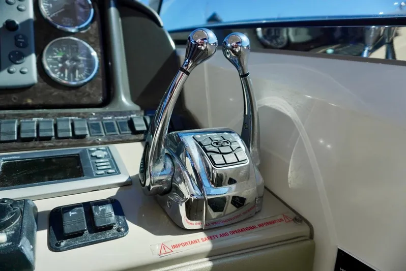  Yacht Photos Pics Control panel of a 2007 Sea Ray 38 Sundancer boat with throttle levers.