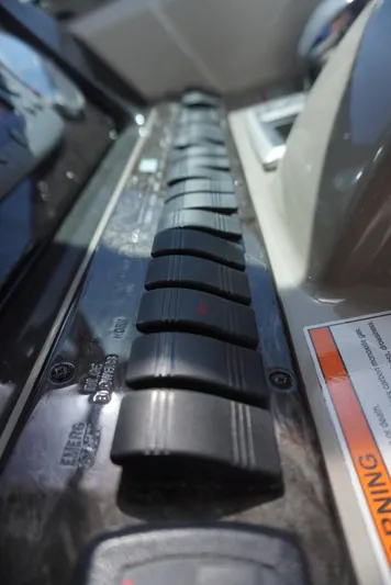  Yacht Photos Pics Control panel of a 2007 Sea Ray 38 Sundancer boat, featuring multiple switches.