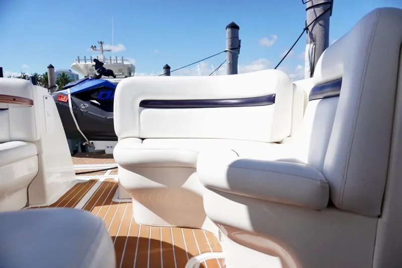  Yacht Photos Pics Luxury seating on 2007 Sea Ray 38 Sundancer yacht, docked with clear skies.