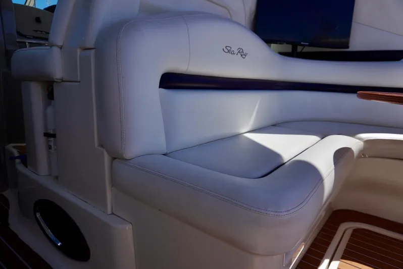  Yacht Photos Pics Luxurious seating on a 2007 Sea Ray 38 Sundancer yacht, featuring elegant white upholstery.