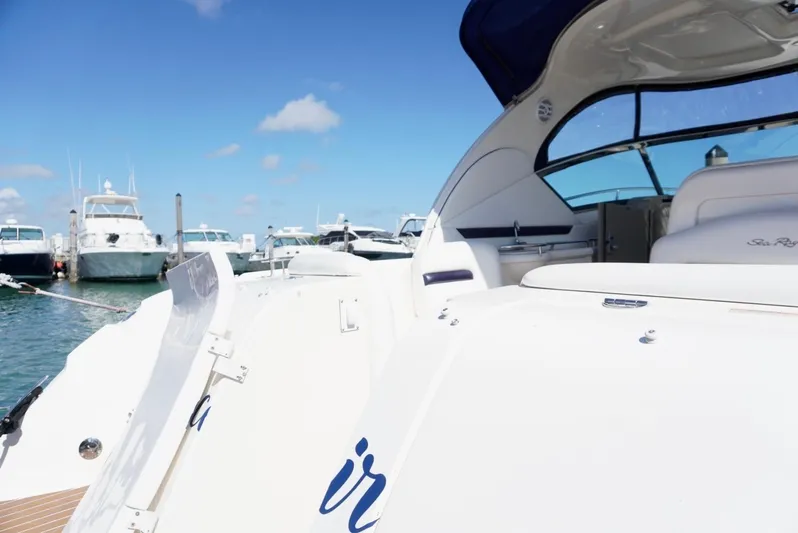  Yacht Photos Pics 2007 Sea Ray 38 Sundancer yacht docked at marina under clear blue sky.