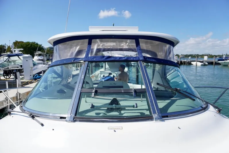  Yacht Photos Pics 2007 Sea Ray 38 Sundancer yacht docked at marina, clear blue sky.