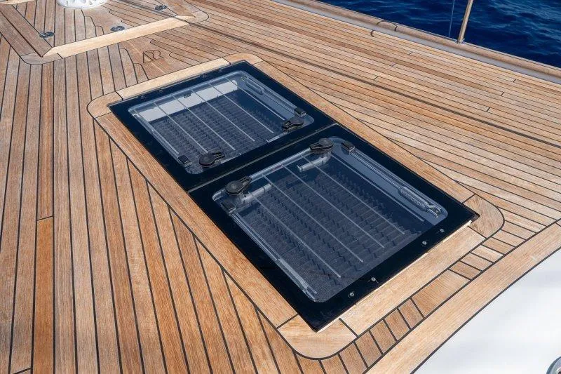 Yacht Photos Pics Teak deck of 2023 Hallberg-Rassy 50 yacht with dual hatches.