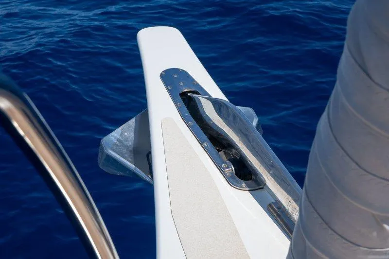  Yacht Photos Pics 2023 Hallberg-Rassy 50 yacht bow detail against deep blue sea.