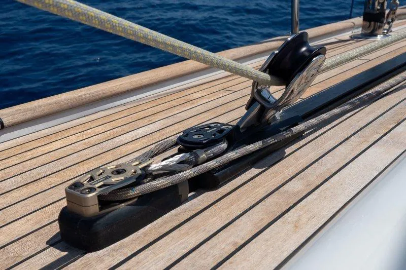  Yacht Photos Pics Deck of 2023 Hallberg-Rassy 50 yacht with rigging details and ocean view.