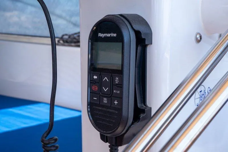  Yacht Photos Pics Raymarine control panel on 2023 Hallberg-Rassy 50 yacht, mounted on white surface.