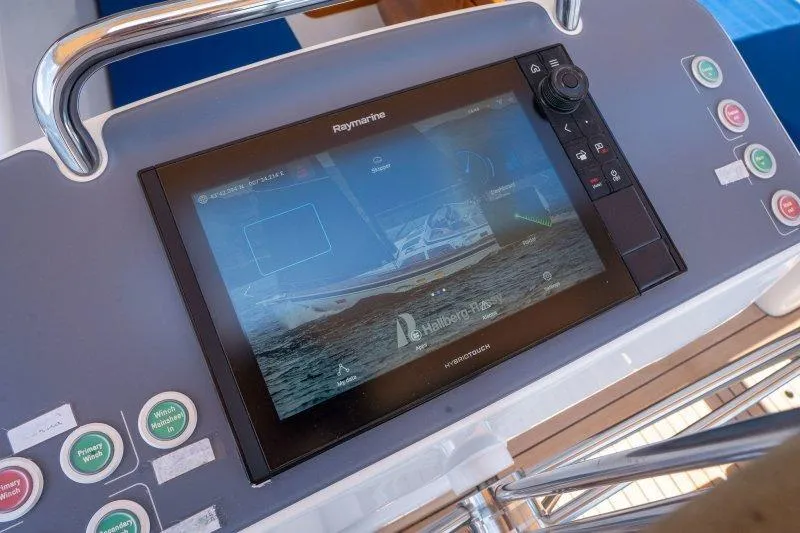  Yacht Photos Pics Control panel of 2023 Hallberg-Rassy 50 yacht with Raymarine navigation display.
