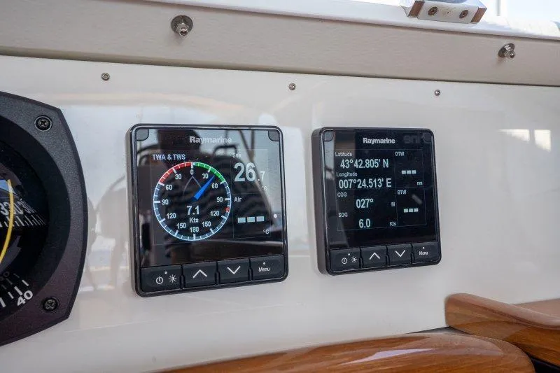  Yacht Photos Pics Digital navigation displays on 2023 Hallberg-Rassy 50 yacht dashboard.