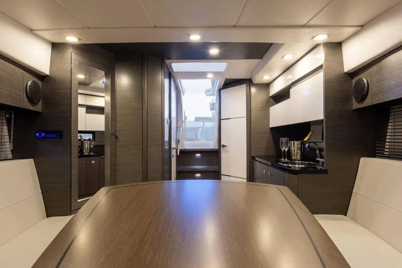  Yacht Photos Pics Luxurious interior of 2025 Cobrey 33 HT yacht with modern furnishings and ambient lighting.