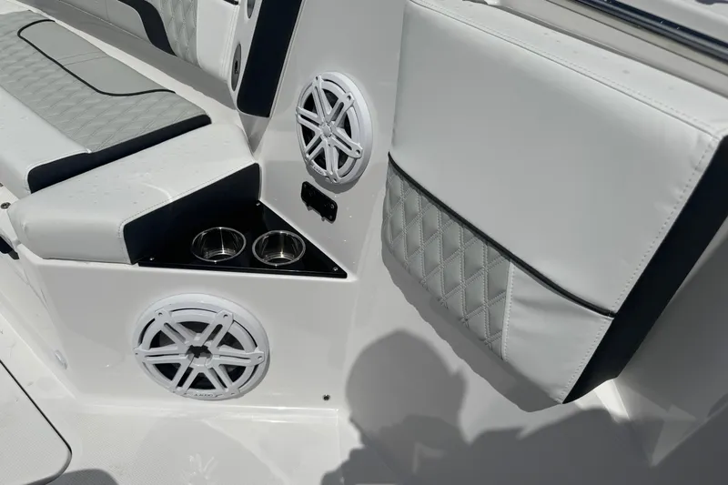  Yacht Photos Pics 2024 Blackfin 332 CC boat interior with speakers and cup holders.