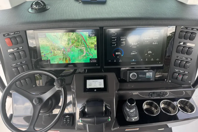  Yacht Photos Pics 2024 Blackfin 332 CC helm with advanced navigation and control systems.