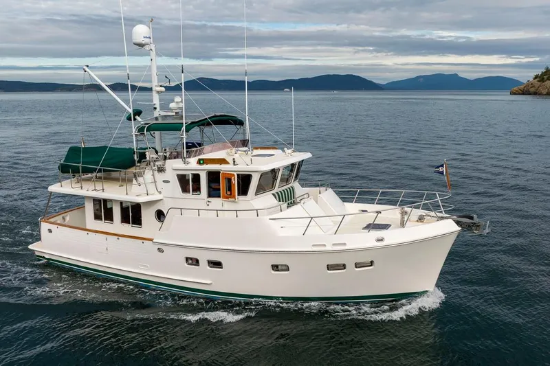 Forever Young Yacht Photos Pics 2009 Selene 43 Ocean Classic yacht cruising on calm waters.