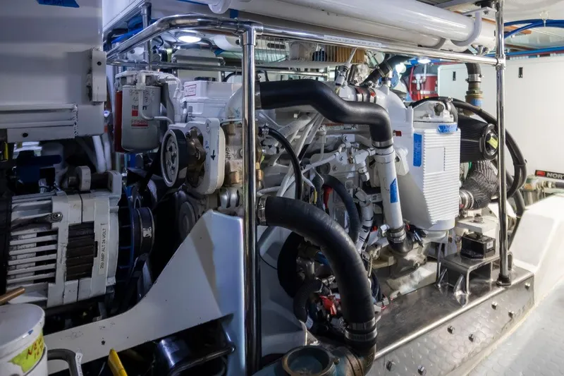 Forever Young Yacht Photos Pics Engine room of a 2009 Selene 43 yacht, showcasing mechanical components and piping.