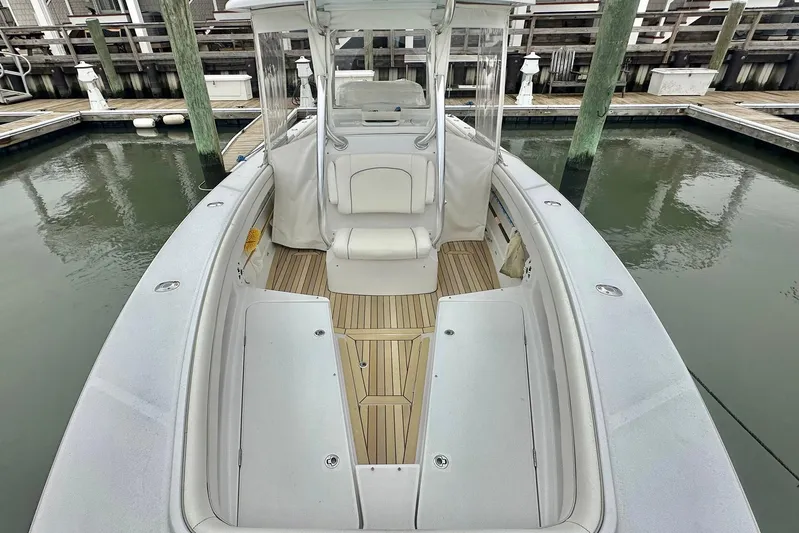 Warden Pass Too Yacht Photos Pics 2013 Jupiter 30 Center Console boat docked, featuring spacious seating and sleek design.