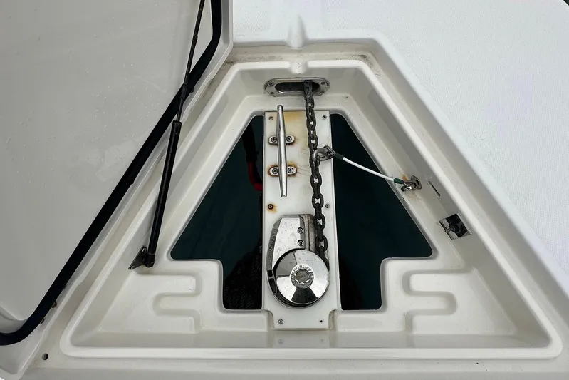 Warden Pass Too Yacht Photos Pics Anchor locker of 2013 Jupiter 30 Center Console boat with chain and winch.