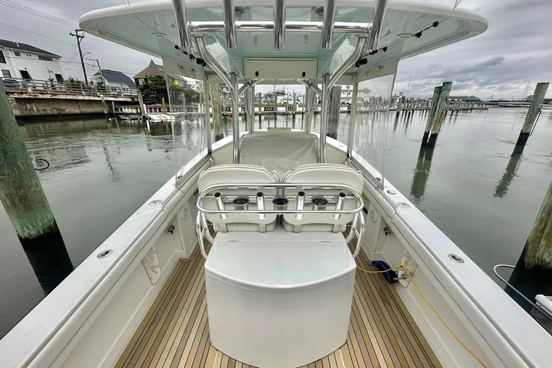 Warden Pass Too Yacht Photos Pics 2013 Jupiter 30 Center Console boat docked, featuring sleek design and spacious deck.