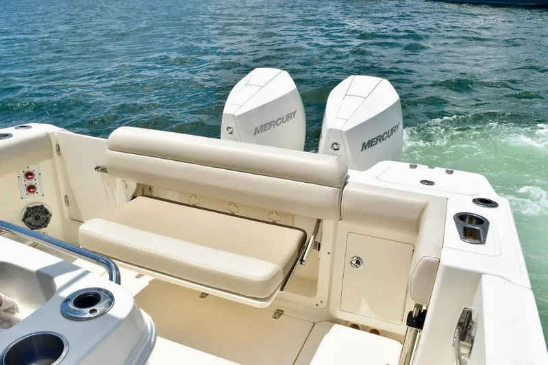  Yacht Photos Pics 2023 Boston Whaler 280 Outrage boat with dual Mercury engines on open water.