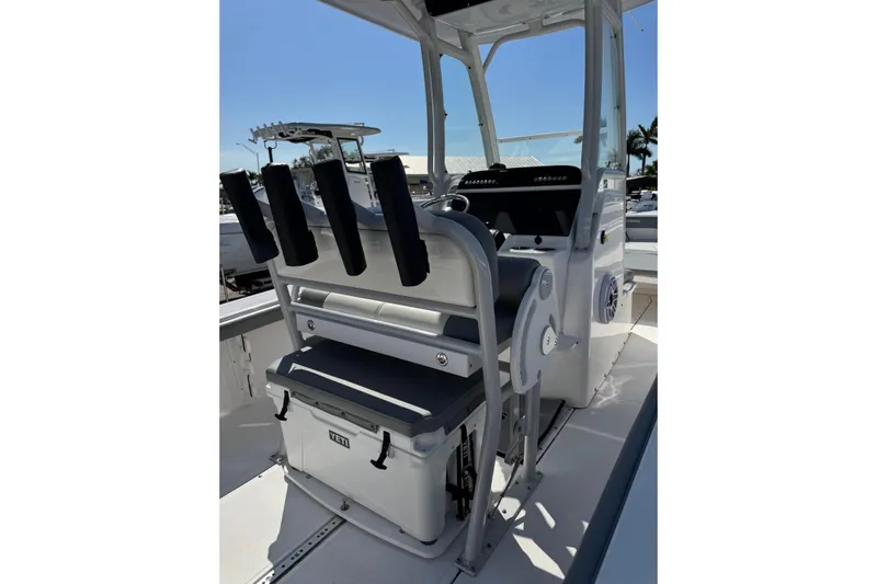  Yacht Photos Pics 2024 Everglades 243 Center Console boat interior with rod holders and Yeti cooler.