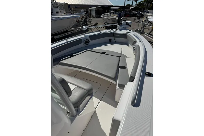  Yacht Photos Pics 2024 Everglades 243 Center Console boat interior with seating and storage.