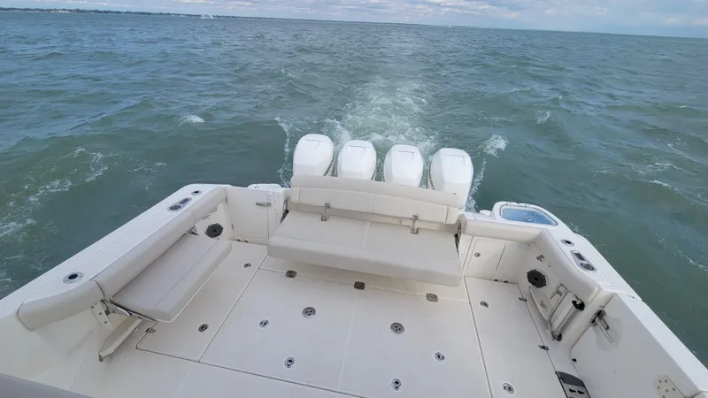  Yacht Photos Pics Boston Whaler 405 Conquest 2021 boat with quad engines cruising on open water.