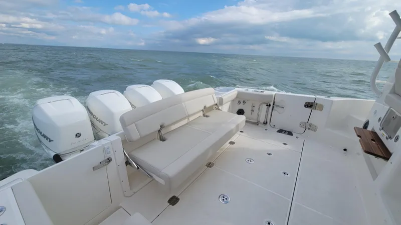  Yacht Photos Pics 2021 Boston Whaler 405 Conquest boat with multiple engines on open water.