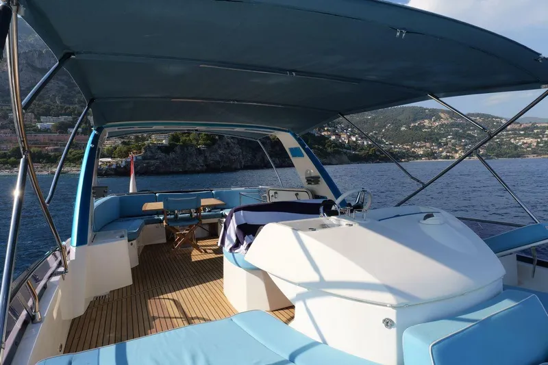 Grace Yacht Photos Pics Luxurious 2013 Prestige 620 yacht interior with scenic coastal view.