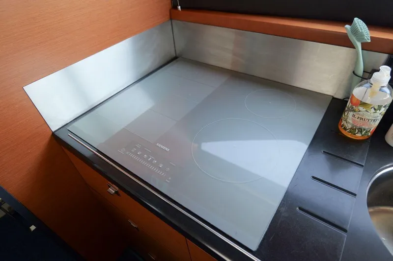 Grace Yacht Photos Pics Modern kitchen cooktop on 2013 Prestige 620 yacht, featuring sleek design and integrated controls.