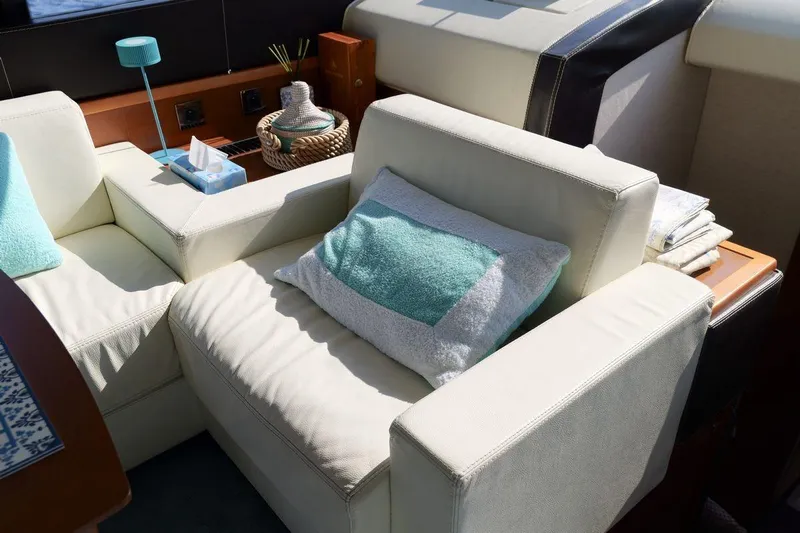 Grace Yacht Photos Pics Luxurious interior of 2013 Prestige 620 yacht with comfortable seating and decor.