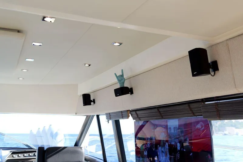 Grace Yacht Photos Pics Interior of 2013 Prestige 620 yacht with modern lighting and entertainment system.