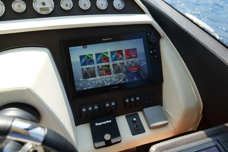Grace Yacht Photos Pics Control panel of a 2013 Prestige 620 yacht with Raymarine navigation system.