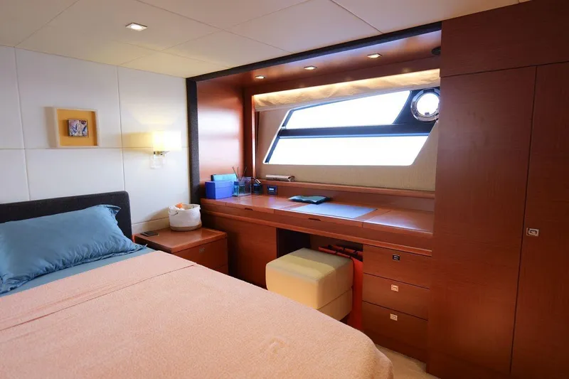 Grace Yacht Photos Pics Luxurious cabin interior of 2013 Prestige 620 yacht with bed and desk.