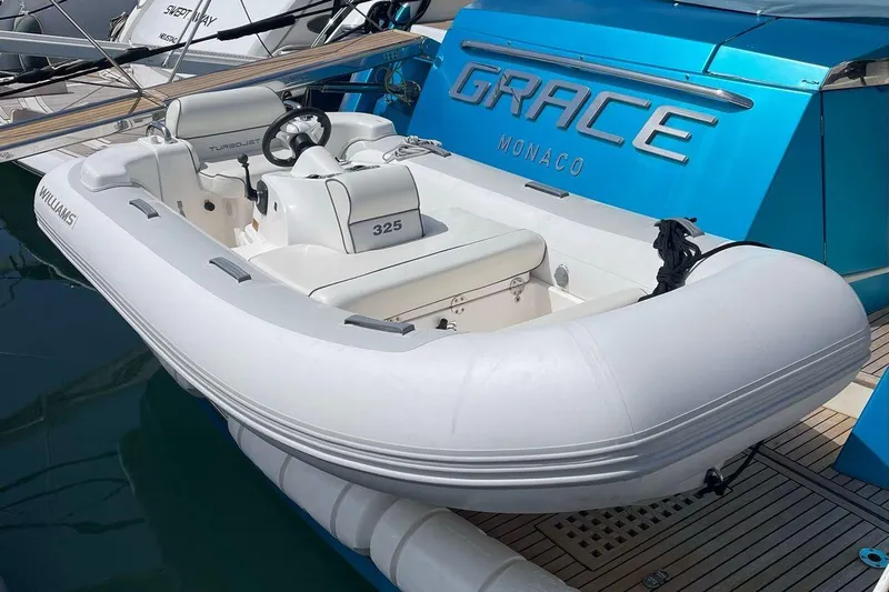 Grace Yacht Photos Pics A 2013 Prestige 620 yacht with a Williams Turbojet 325 tender in Monaco.