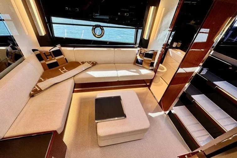  Yacht Photos Pics Luxurious interior of 2018 Riva 56' Rivale yacht with elegant seating and modern design.