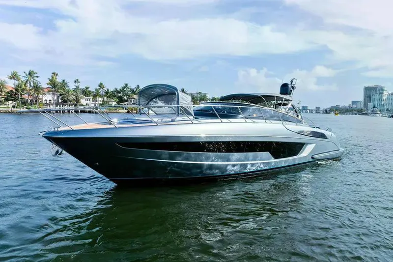  Yacht Photos Pics 2018 Riva 56' Rivale yacht on water, sleek design, luxury vessel.