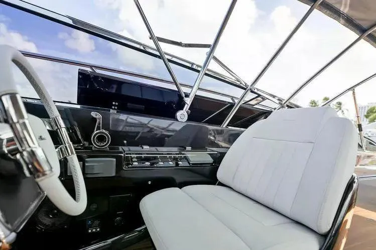  Yacht Photos Pics Interior of 2018 Riva 56' Rivale yacht, featuring sleek design and luxurious seating.
