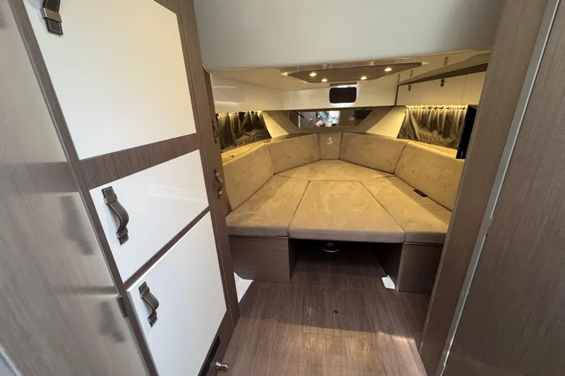  Yacht Photos Pics Interior of 2022 Beneteau Gran Turismo 32 yacht, featuring cozy seating and modern design.