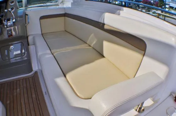  Yacht Photos Pics Luxurious seating on 2012 Sea Ray 540 Sundancer yacht with beige upholstery.