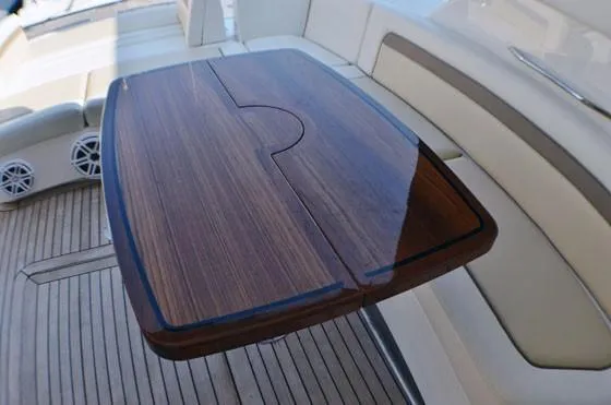  Yacht Photos Pics Luxury wooden table on 2012 Sea Ray 540 Sundancer yacht deck.