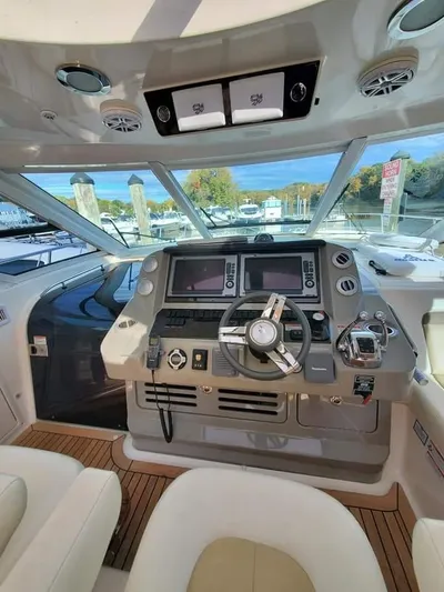  Yacht Photos Pics 2012 Sea Ray 540 Sundancer helm with modern navigation controls and panoramic view.