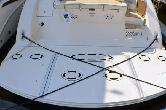  Yacht Photos Pics 2012 Sea Ray 540 Sundancer yacht stern with swim platform and mooring lines.