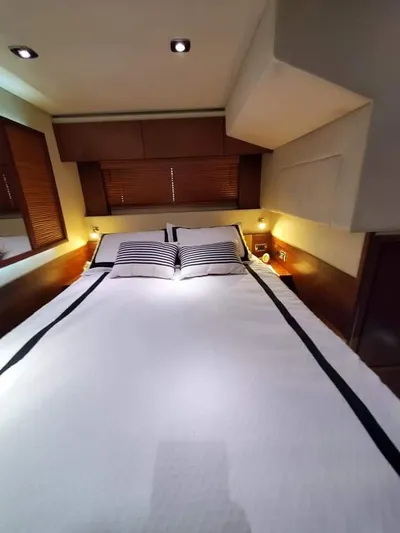  Yacht Photos Pics Luxurious bedroom interior of 2012 Sea Ray 540 Sundancer yacht with modern design.