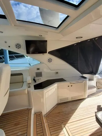  Yacht Photos Pics Luxurious 2012 Sea Ray 540 Sundancer yacht interior with wood flooring and modern amenities.