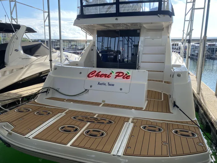Cheri Pie Yacht Photos Pics 2008 Sea Ray 47 Sedan Bridge yacht docked, featuring teak deck and "Cheri Pie" nameplate.