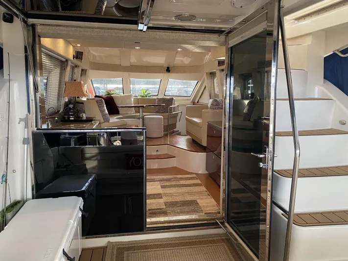 Cheri Pie Yacht Photos Pics Luxurious interior of a 2008 Sea Ray 47 Sedan Bridge yacht, featuring elegant seating and modern design.