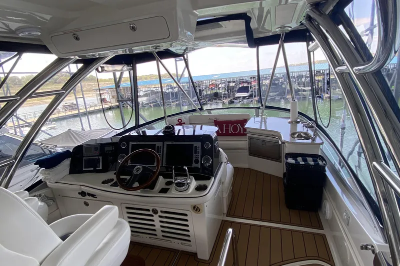 Cheri Pie Yacht Photos Pics 2008 Sea Ray 47 Sedan Bridge helm with modern controls and panoramic marina view.